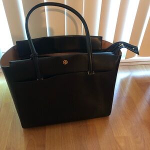 Lightly used, Tory Burch black leather bag with zipper.